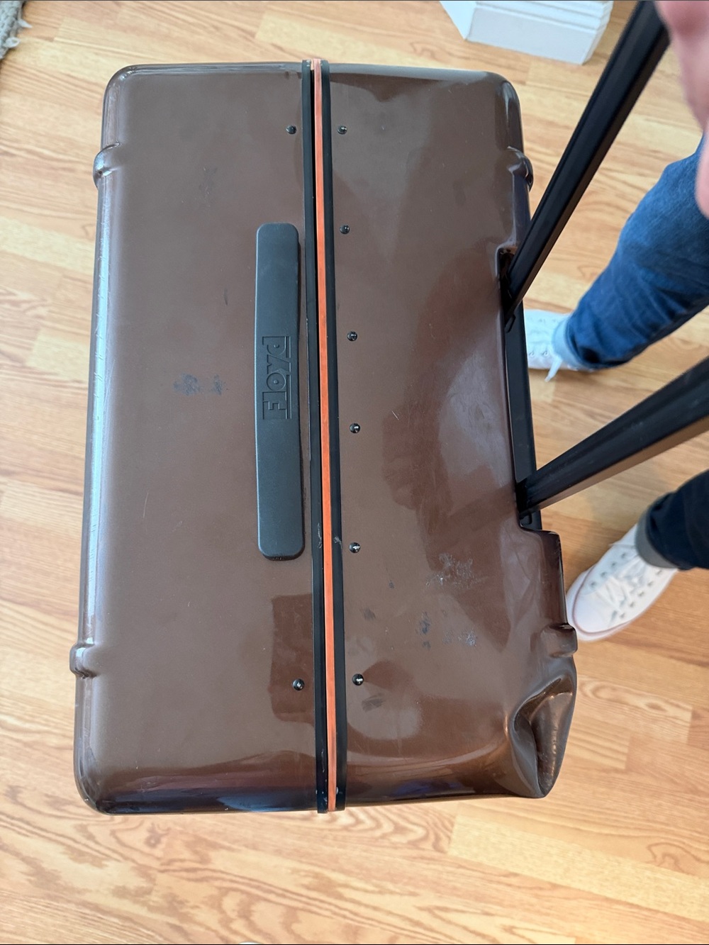 Floyd Brown Hardshell Suitcase with Bright Orange Interior and Red Wheels - Picture 9 of 17